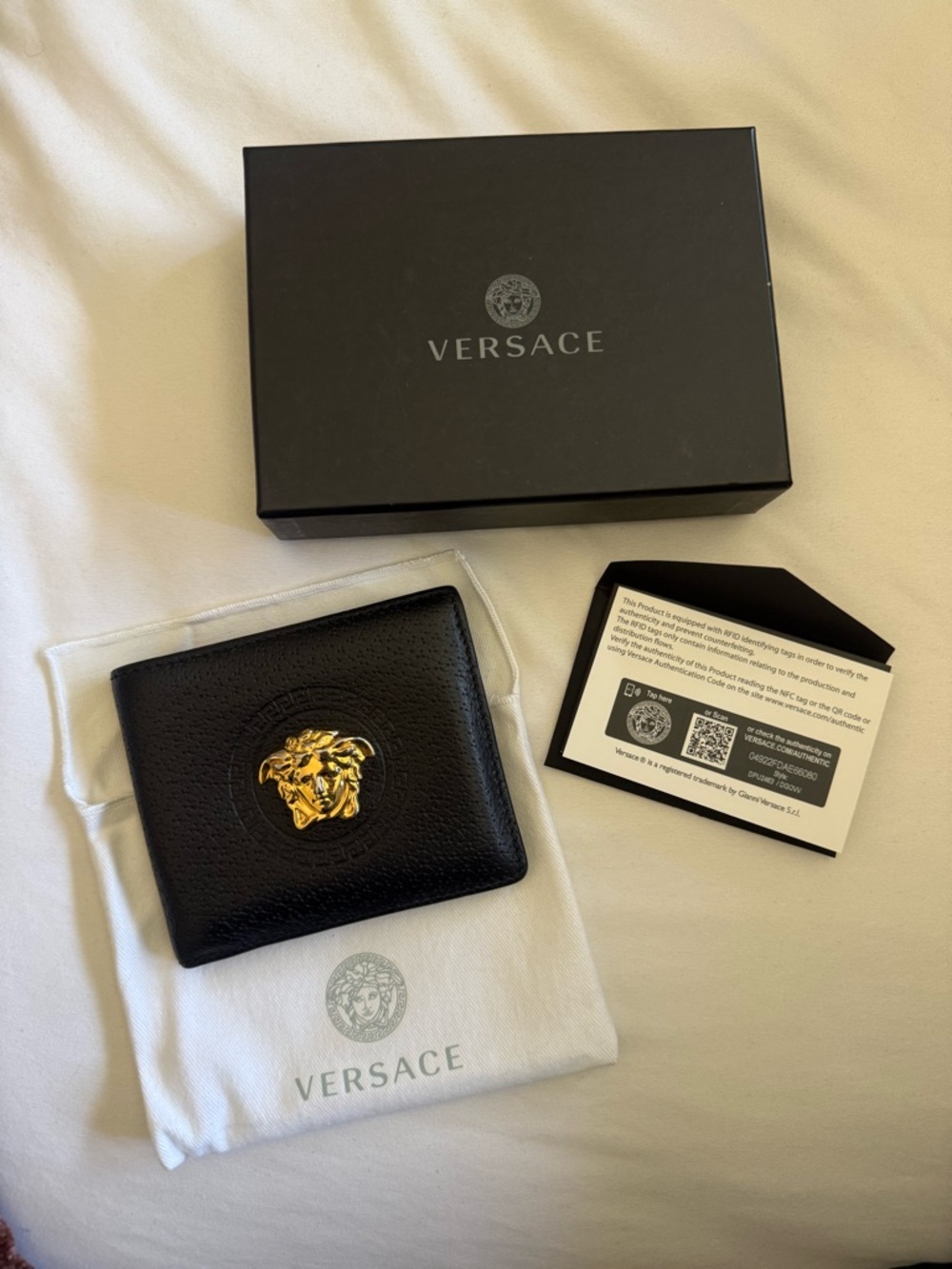 Versace Black Leather Money Clip with Gold Medusa Emblem